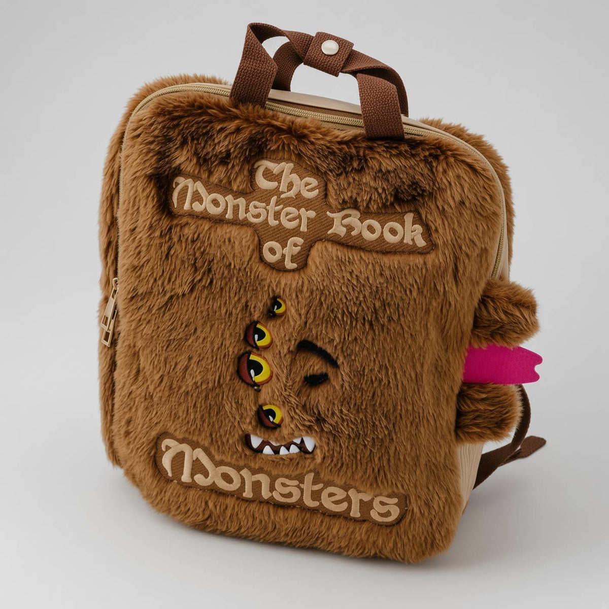 HARRY POTTER 12" BOOK OF MONSTERS PLUSH BACKPACK EMB DETAIL